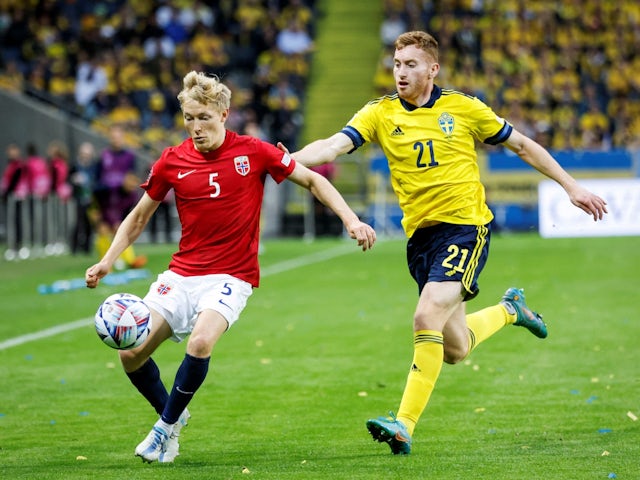 Norway's Birger Meling in action with Sweden's Dejan Kulusevski on June 5, 2022