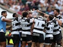 Barbarians celebrating a try during their victory over England on June 19, 2022.