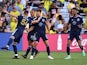 Sporting Kansas City midfielder Graham Zusi (8) celebrates with teammates after a goal during the second half against Nashville SC at Geodis Park on June 19, 2022