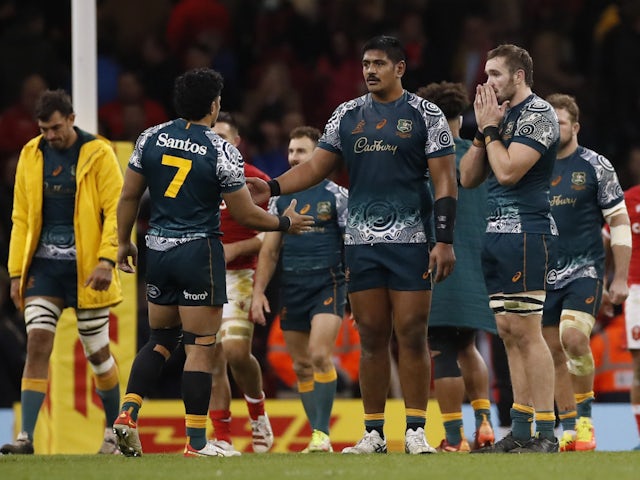 Australia's Pete Samu and teammates look dejected after the match on June 19, 2022
