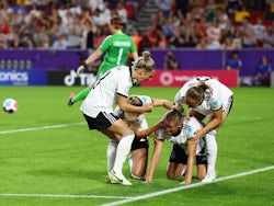 Germany Women's Alexandra Popp celebrates scoring their fourth goal with teammates on July 8, 2022