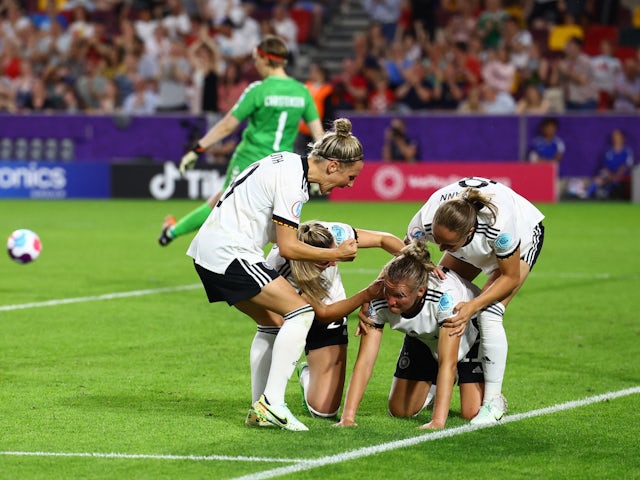 Germany Women's Alexandra Popp celebrates scoring their fourth goal with teammates on July 8, 2022