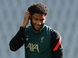 Joe Gomez warms up for Liverpool in May 2022