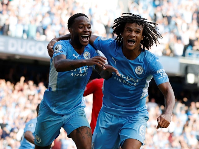 Manchester City's Raheem Sterling celebrates scoring their first goal with Nathan Ake that was later disallowed on September 18, 2021