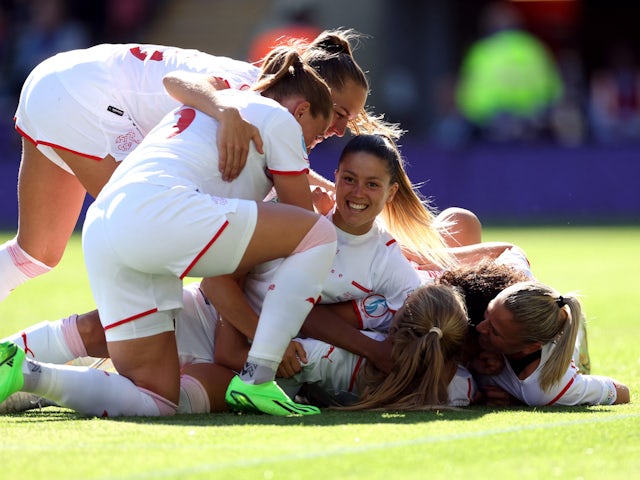 Switzerland Women's Rahel Kiwic celebrates scoring their second goal with teammates on July 9, 2022
