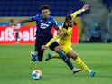 Hoffenheim's Chris Richards in action with Borussia Dortmund's Donyell Malen on January 22, 2022