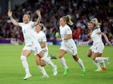Lucy Bronze celebrates scoring for England against Sweden on July 26, 2022
