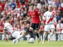 Manchester United's Alejandro Garnacho in action with Rayo Vallecano's Unai Lopez on July 31, 2022