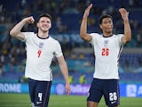 England's Declan Rice and Jude Bellingham celebrate after the match on July 3, 2021