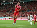 Hwang Ui-jo celebrates scoring for South Korea against Egypt in June 2022.