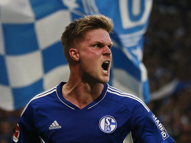 Marius Bulter celebrates scoring for Schalke on August 13, 2022