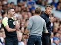 Wolverhampton Wanderers manager Bruno Lage reacts towards Leeds United manager Jesse Marsch as fourth official Michael Oliver looks on on August 6, 2022