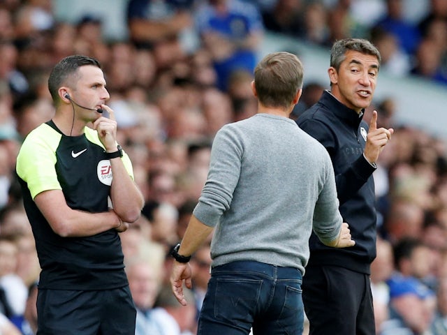 Wolverhampton Wanderers manager Bruno Lage reacts towards Leeds United manager Jesse Marsch as fourth official Michael Oliver looks on on August 6, 2022