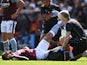 Aston Villa defender Diego Carlos receiving treatment during the Premier League game with Everton on August 13, 2022.