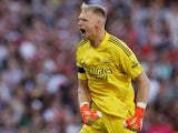 Arsenal's Aaron Ramsdale celebrates on August 27, 2022