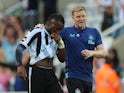 Newcastle United's Allan Saint-Maximin and manager Eddie Howe after the match on August 21, 2022