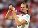 England's Jill Scott celebrates with a medal after winning the women's Euro 2022 on July 31, 2022 