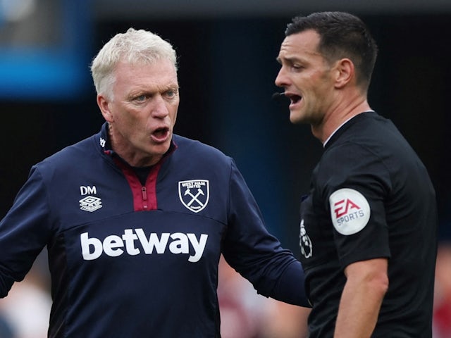 West Ham United manager David Moyes talks to referee Andrew Madley after the match on September 3, 2022