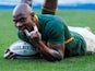 South Africa's Makazole Mapimpi celebrates scoring their second try in November 2021