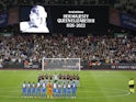 General view of the players during a minutes silence before the match after the death of Britain's Queen Elizabeth on September 8, 2022