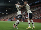 Ajax's Mohammed Kudus celebrates scoring their first goal with Steven Berghuis  on September 13, 2022