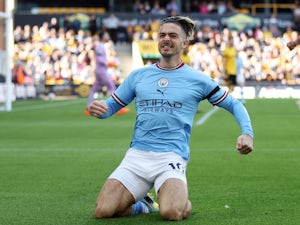 Jack Grealish celebrates scoring for Manchester City on September 17, 2022