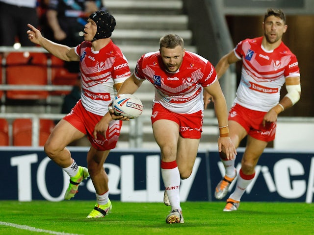 St Helens' Joe Batchelor scores their sixth try in June 2022