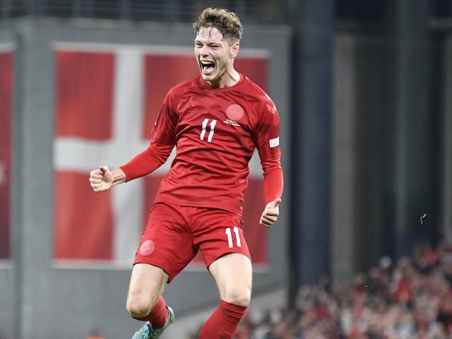 Andreas Skov Olsen celebrates scoring for Denmark on September 25, 2022
