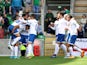 Cyprus' Andronikos Kakoulli celebrates scoring their first goal with teammates on June 12, 2022