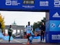 Kenya's Eliud Kipchoge celebrates as he wins the Berlin Marathon and breaks the World Record on September 25, 2022
