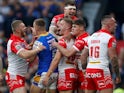 St Helens' Matty Lees celebrates scoring their first try with teammates on September 24, 2022