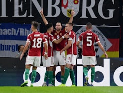 Hungary's Adam Szalai celebrates scoring their first goal with teammates on September 23, 2022