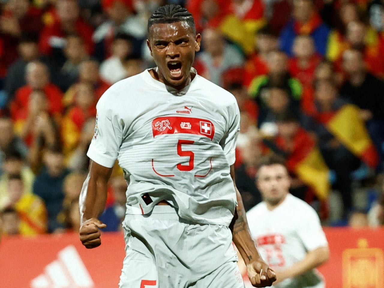 Manuel Akanji celebrates scoring for Switzerland on September 24, 2022 ...