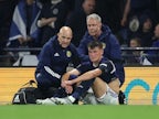 Everton defender Nathan Patterson stretchered off for Scotland