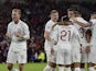 Poland celebrate scoring against Wales in the UEFA Nations League on September 25, 2022.