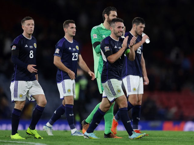 Scotland's John McGinn celebrates with his teammates after the match on 21 September 2022