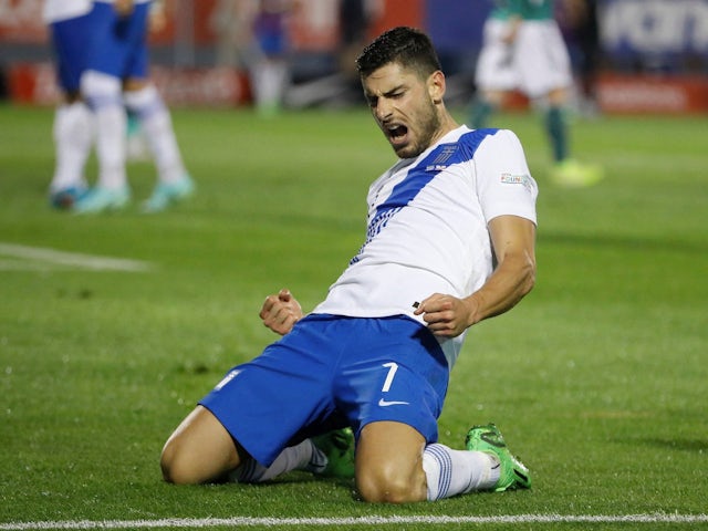 Girogos Masouras celebrates scoring for Greece on September 27, 2022