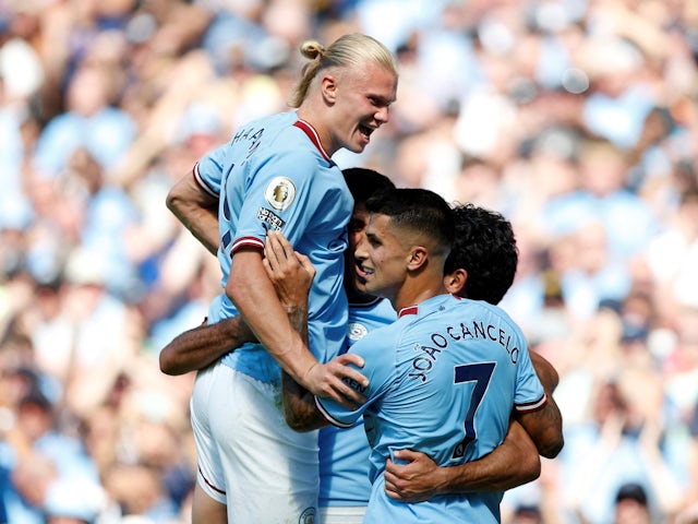 Manchester City's Ilkay Gundogan celebrates scoring the first goal with Erling Braut Haaland, Rodri and Joao Cancelo on 13 August 2022