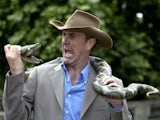 Phil Tufnell pictured with a snake in July 2003