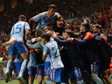 Spain's Alvaro Morata celebrates scoring their first goal with teammates on September 27, 2022