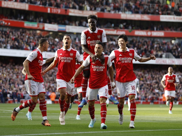 Arsenal's Gabriel Martinelli celebrates scoring their first goal with Takehiro Tomiyasu, Granit Xhaka, William Saliba and Bukayo Saka on October 8, 2022