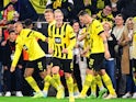 Borussia Dortmund players celebrate Anthony Modeste's goal against Bayern Munich on October 8, 2022