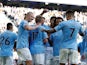 Manchester City's Erling Braut Haaland celebrates scoring their fourth goal with teammates on October 8, 2022