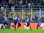 Inter Milan's Hakan Calhanoglu celebrates scoring their first goal with Lautaro Martinez and Nicolo Barella on October 4, 2022
