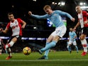 Manchester City's Kevin De Bruyne in action with Southampton's Cedric Soares and Oriol Romeu on November 29, 2017
