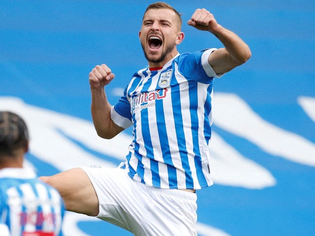 Michal Helik celebrates scoring for Huddersfield Town on October 9, 2022