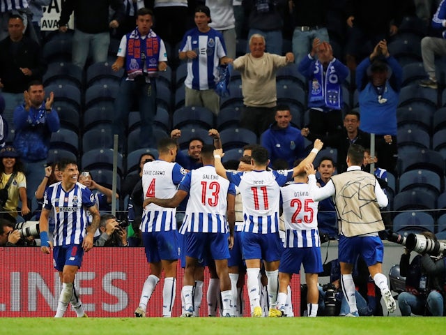 Porto edge past 10-man Leverkusen to claim first win in Group B