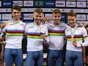 Great Britain's Ethan Hayter, Oliver Wood, Ethan Vernon and Daniel Bigham celebrate on the podium with medals after winning gold on the Men's Team Pursuit Final on October 13, 2022