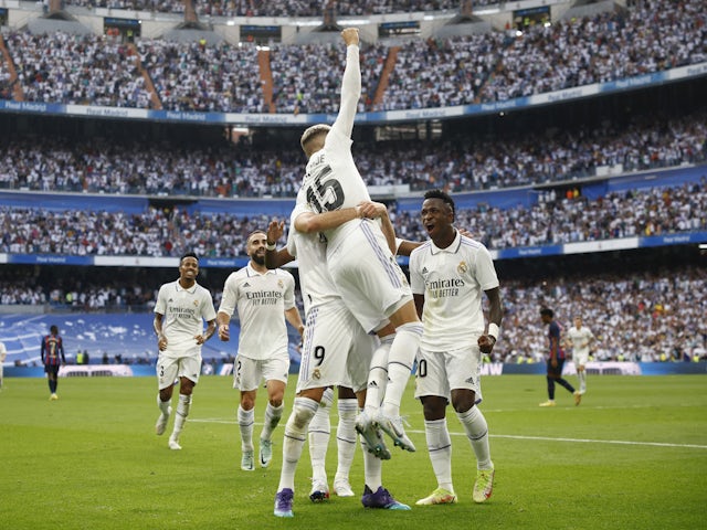 Real Madrid players celebrate Federico Valverde's goal against Barcelona on October 16, 2022