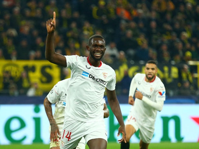 Tanguy Nianzou celebrates his goal for Sevilla against Borussia Dortmund on October 11, 2022
